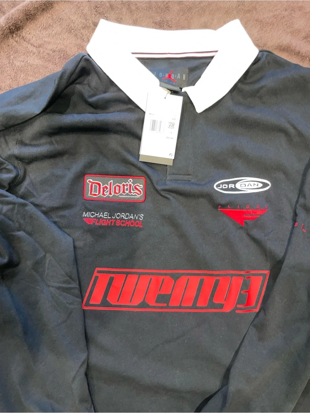 Jordan Black Long-Sleeve Rugby Polo with Red Accents and White Collar